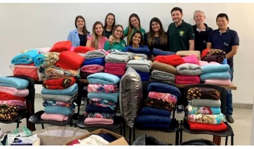 Representantes das ligas acadmicas e da clnica, na recepo s doaes (Divulgao/PAI).