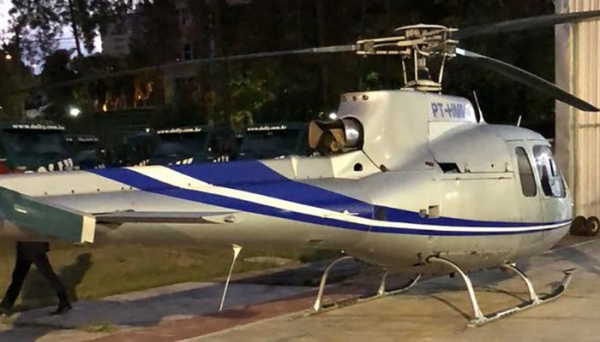 Um dos helicópteros apreendiso na operação que levou o dono da marca de refrigerantes Dolly à prisão (MPSP).