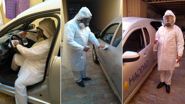 Com equipamentos de proteção individual, colaborador da Haddad Organização Social faz a sanitização completa dos veículos usados no transporte funerário (Cedida).