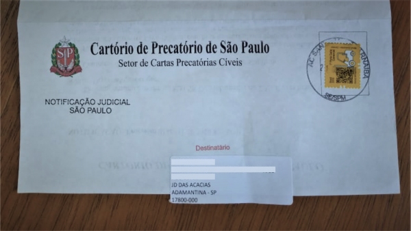 Correspondência recebida pelo morador de Adamantina, em sua casa (Reprodução).