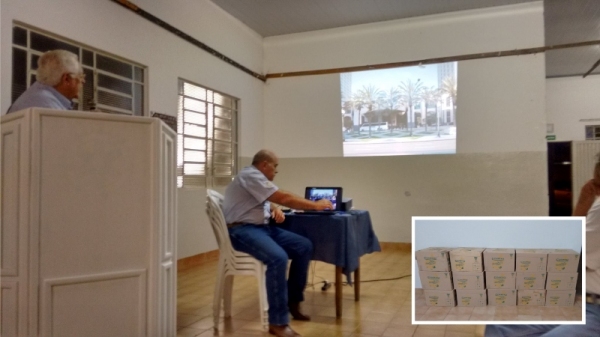 Governador 2010/2011, Dr. Joamyr de Castro durante apresentação de informações rotárias e em destaque, os 240 litros de óleos novos (Foto: Assessoria de Imprensa).