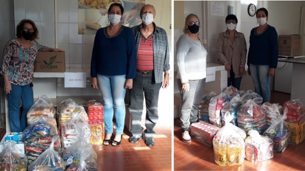 Representantes do Ave Cristo e Casa da Sopa, na retirada dos alimentos (Da Assessoria).