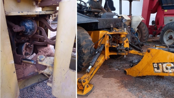 Parte da pá carregadeira danificada, agora sob reparos e manutenção, para que volte a operar. Imagem mostra, também, a retroescavadeira desmontada, para conserto (Fotos: Cedidas).