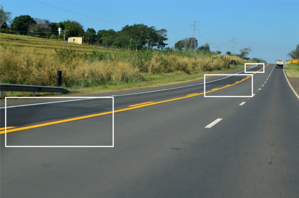 Um ano depois da obra de recapeamento, trecho da Rodovia Comandante de Barros, próximo a Pacaembu, já tem vários pontos com recortes no asfalto (Foto: Acácio Rocha)